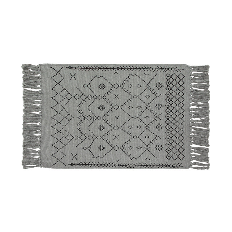 Woven cotton rug runner with flat weave structure, graphic diamond ethnic pattern and fringes