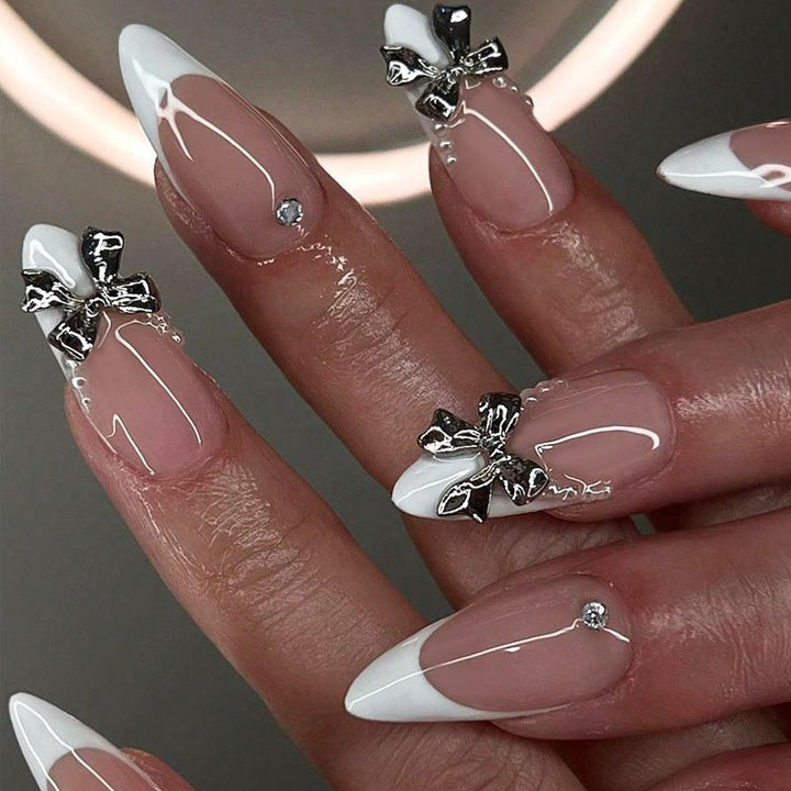 Artificial nail set with elegant French tips and decoration accents Kalsten
