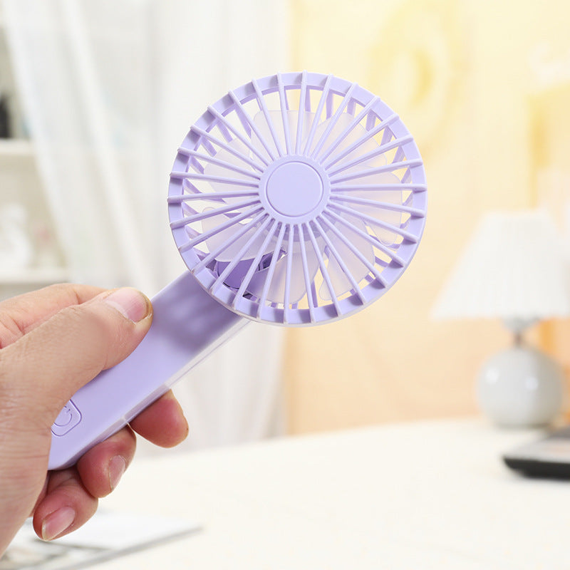 Women portable handheld fan with ergonomic design and fast air circulation Kalsten