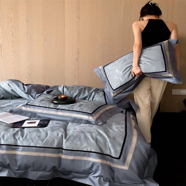 Premium bed set made of heavy cotton satin with woven mosaic relief and double stitched hem