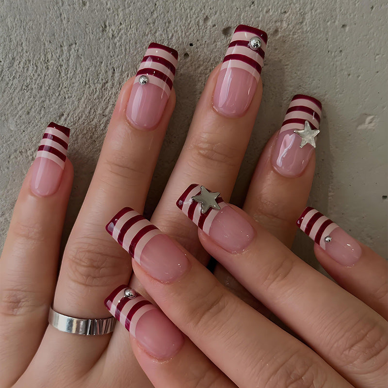 Nail art set with modern stripe design and sparkling stars Kalsten