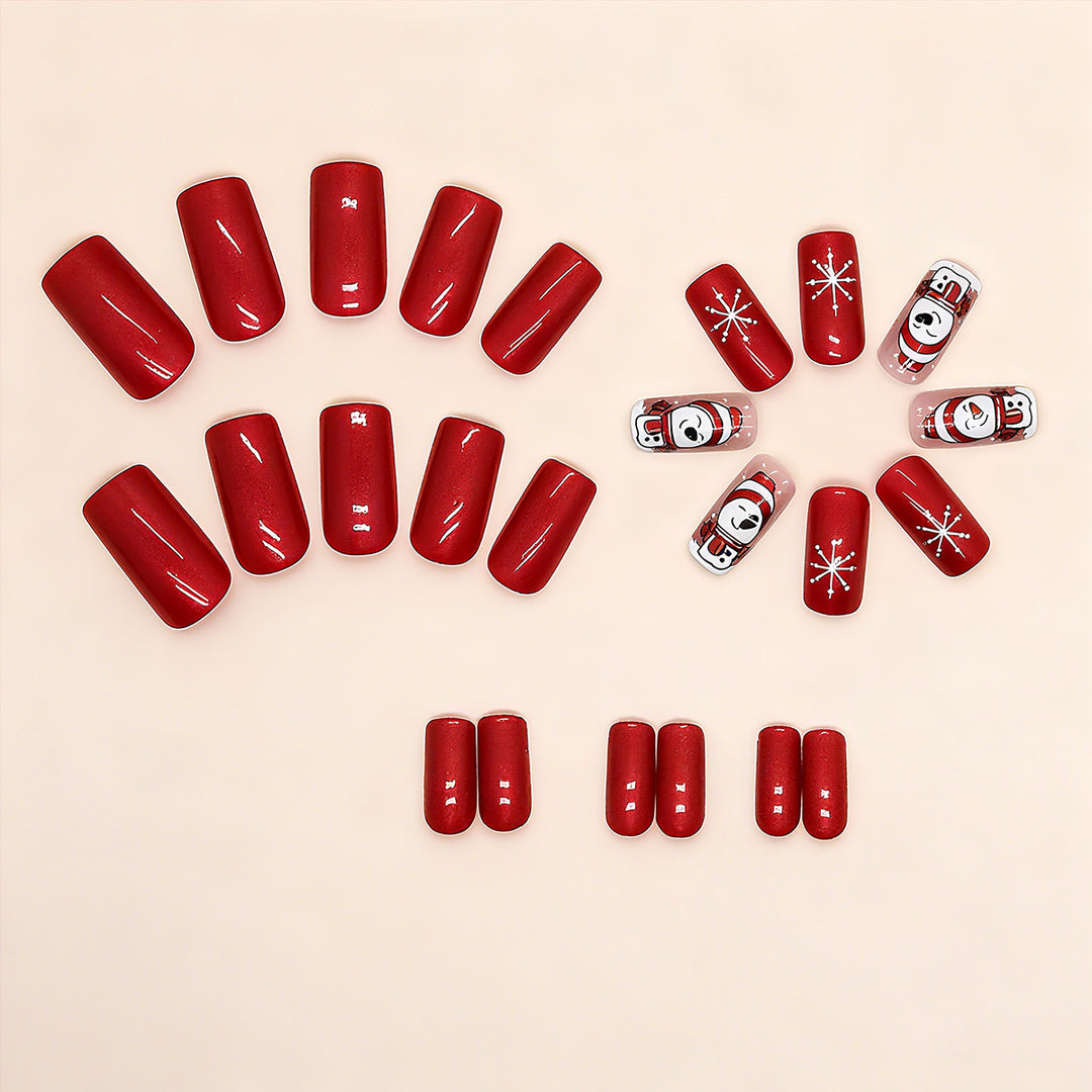 Artificial nail set with festive snowman design and glitter accents Kalsten