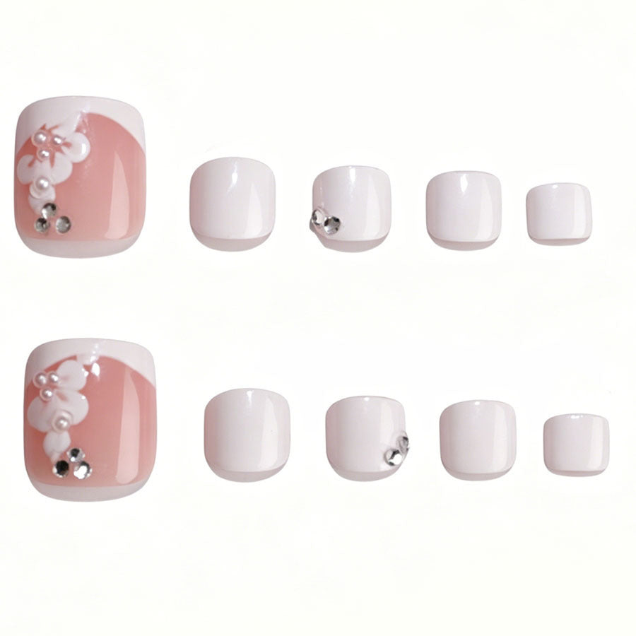 Nail art set with elegant flower design and glitter accents Kalsten