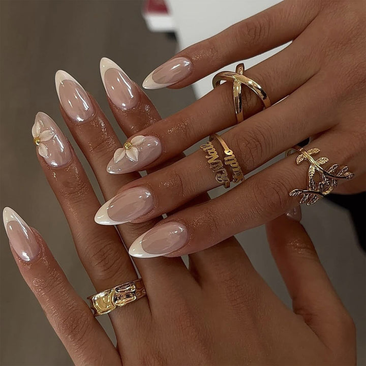 Artful stiletto nails with elegant floral design Kalsten