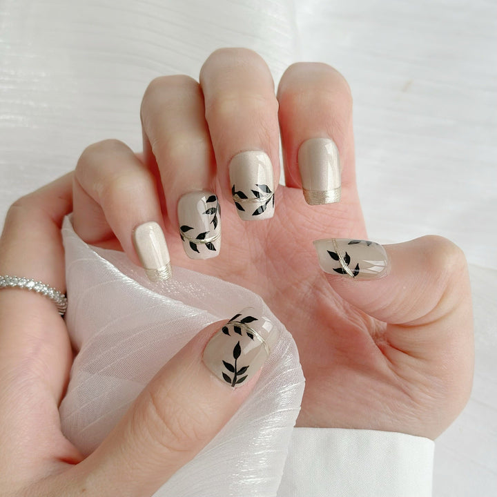 Artistic Press-On Nail Set with Floral Accents