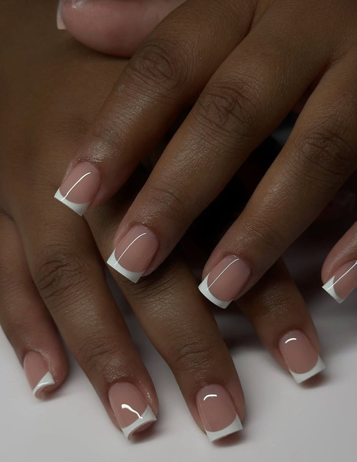 Artificial nails in elegant French tip design Kalsten