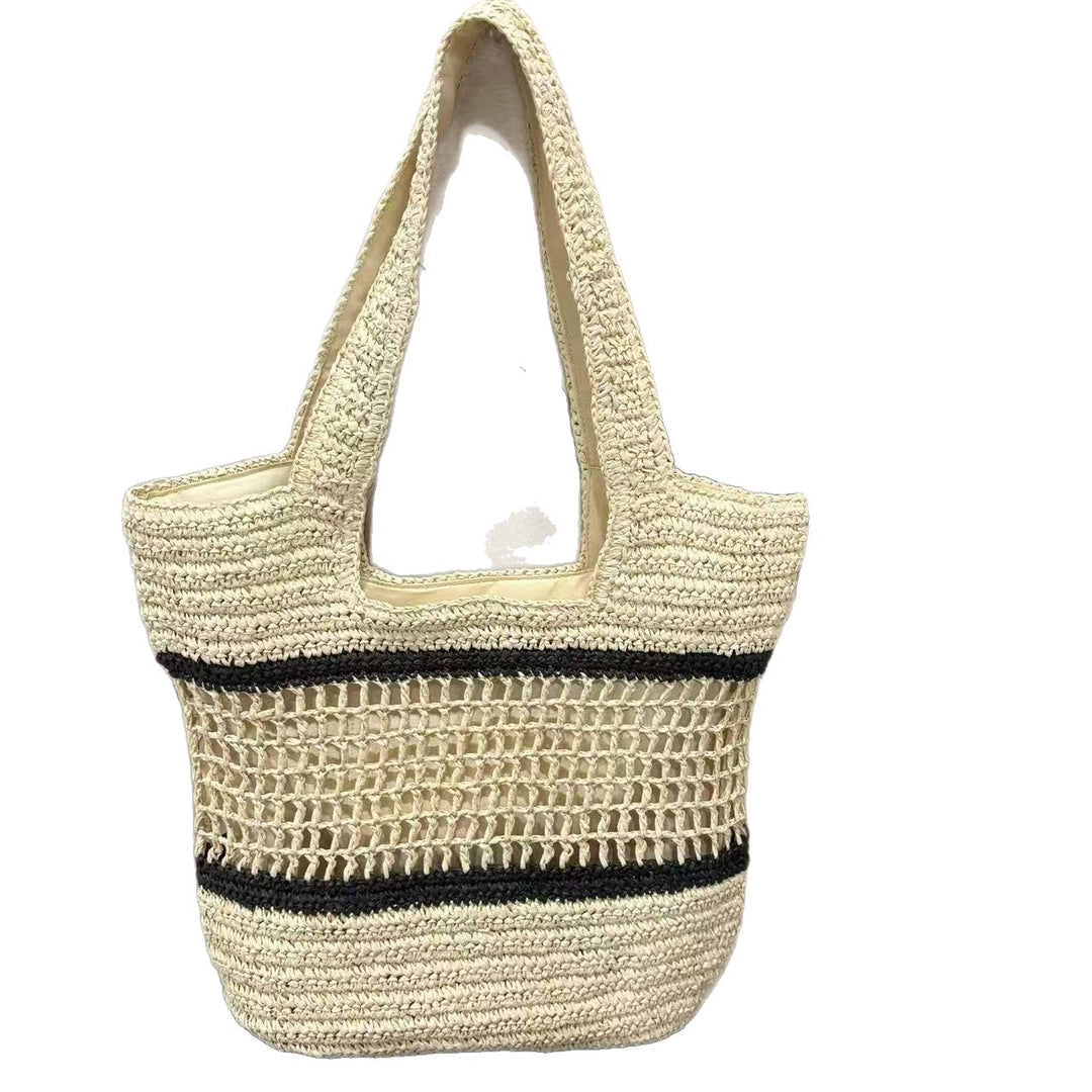 Woven natural material handbag with elegant structure Kalsten