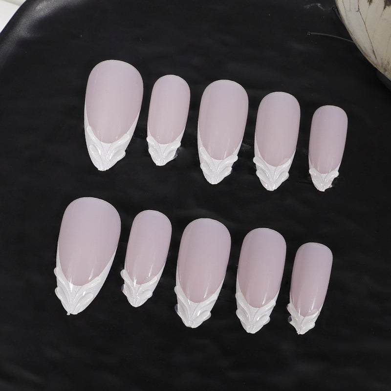 Artifical nail set with elegant tips and subtle embellishments Kalsten
