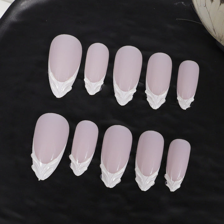 Artifical nail set with elegant tips and subtle embellishments Kalsten
