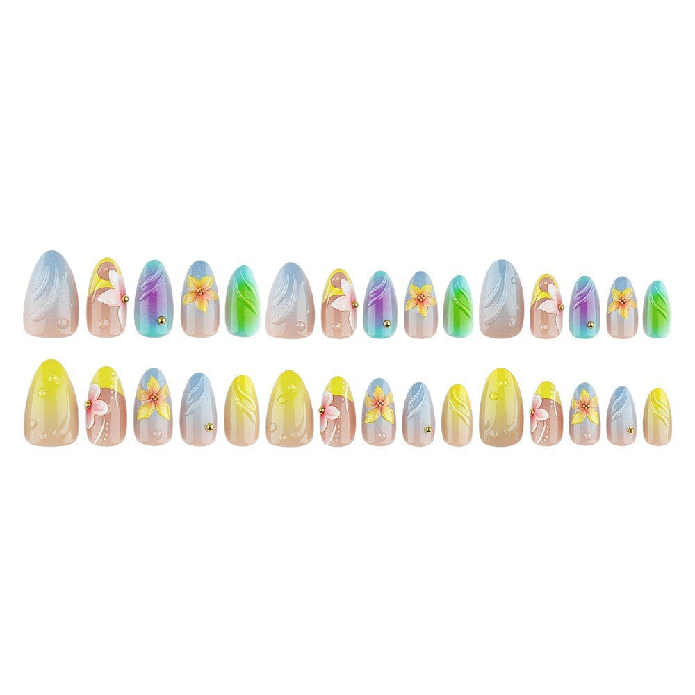 Acrylic nail set with floral elements and colorful accents Kalsten