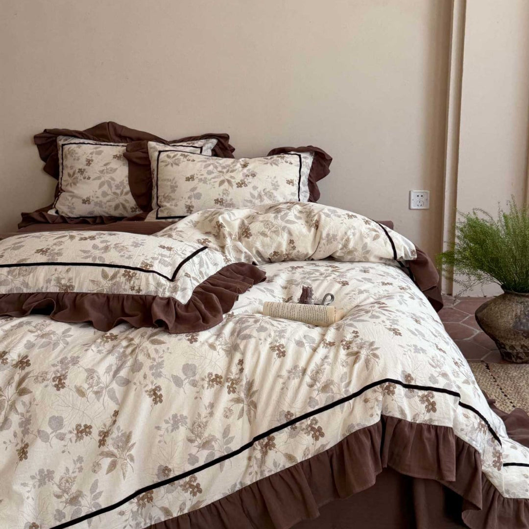Floral cotton bedding set with ruffles and fine piping