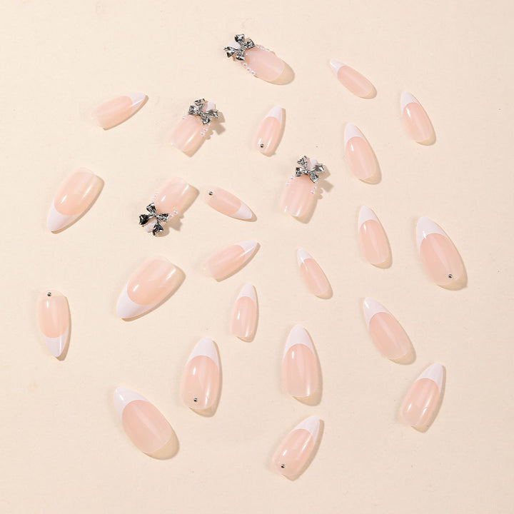 Elegant Stiletto Nail Art with Rhinestone Accents Kalsten