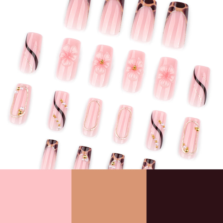 Artificial nail art with flower and glitter effects Kalsten