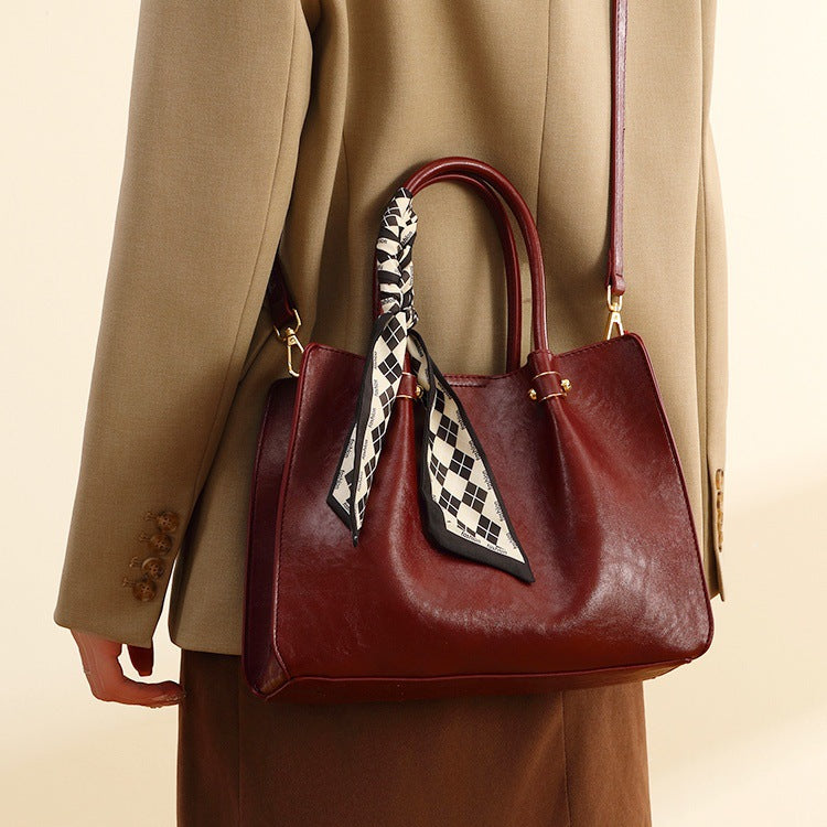 Chic Leather Tote Bag with Scarf Detail