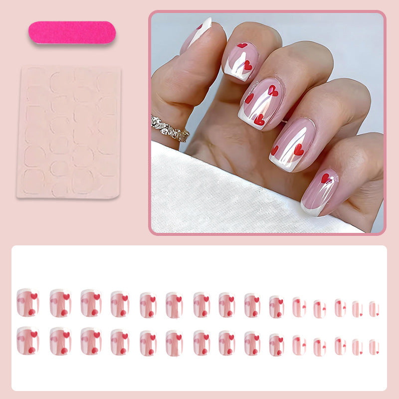 Acrylic nail set with romantic hearts and elegant French tips Kalsten