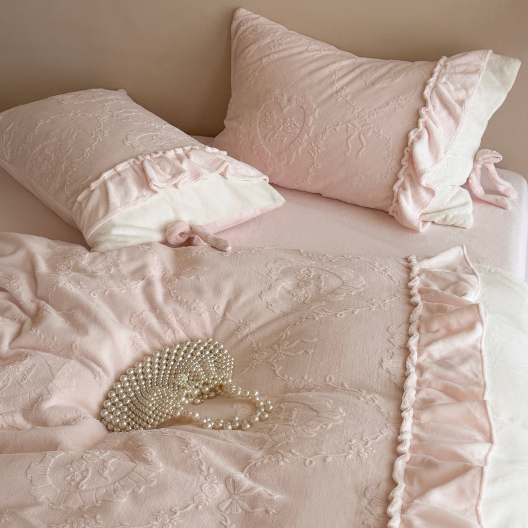 Romantic cotton satin bedding set with ruffled hem and fine tone-on-tone embroidery