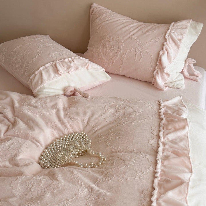Romantic cotton satin bedding set with ruffled hem and fine tone-on-tone embroidery
