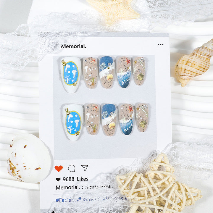 Artificial nail set with maritime designs and elegant embellishments Kalsten
