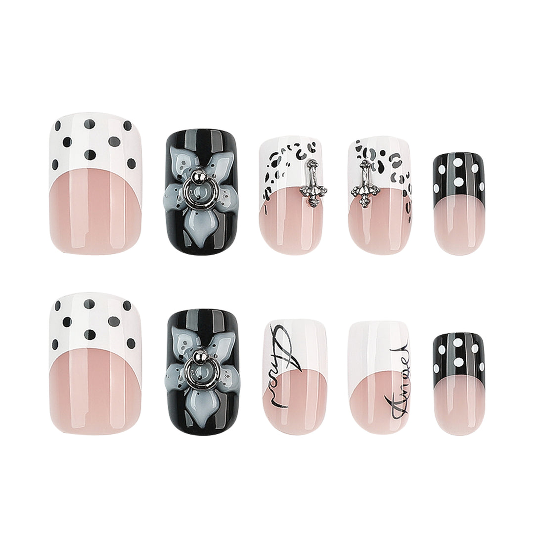 Artful nail extensions with elegant black-and-white design Kalsten