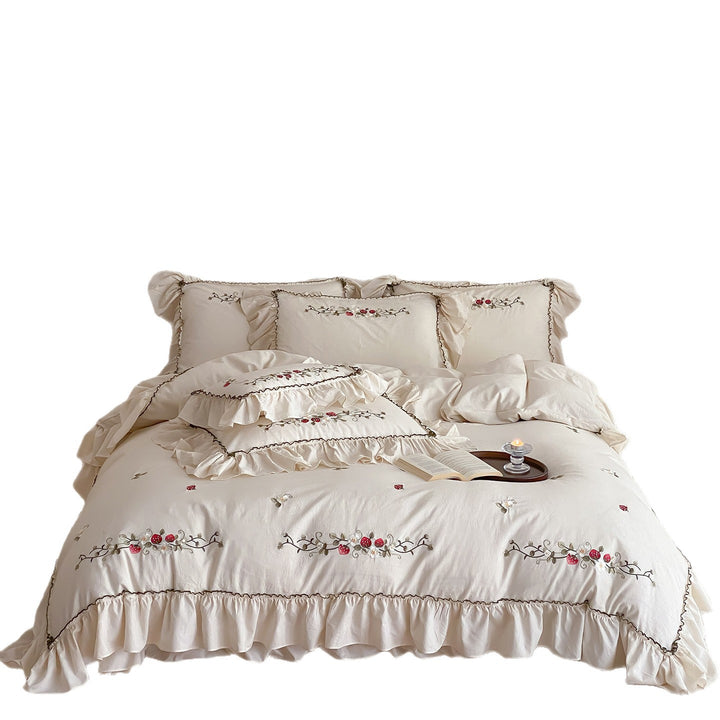 Country house style embroidered bedding set with strawberry motif and ruffle