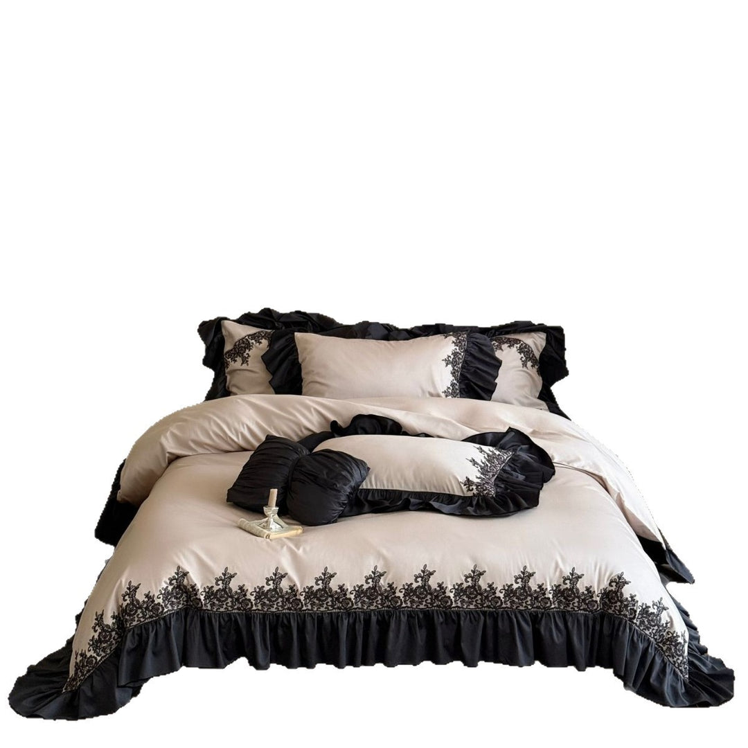 Satin bedding set with contrasting ruffle and ornament embroidery