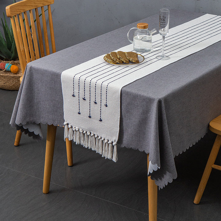 Decorative web runner for dining table with hand-tufted dots and fringes
