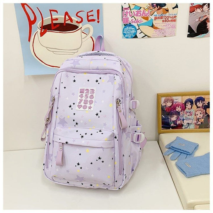 Playful backpack with star motifs and practical functions Kalsten