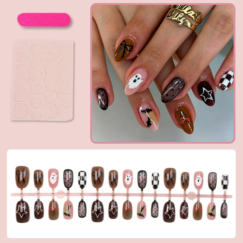 Artificial nail set with creative Halloween designs and glittering accents Kalsten