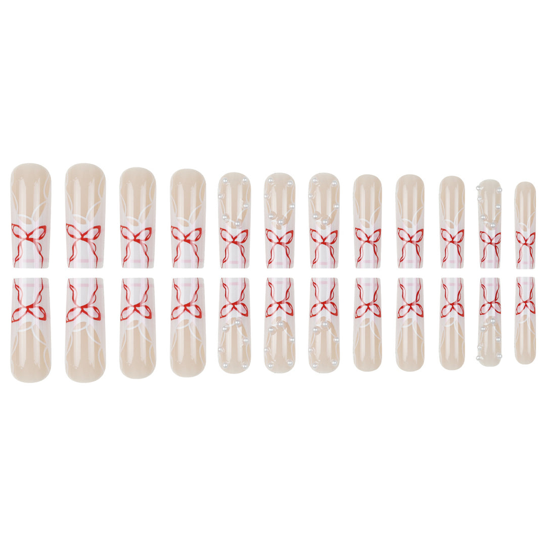 Decorative Press-On Nail Art with Ribbon Accents Kalsten