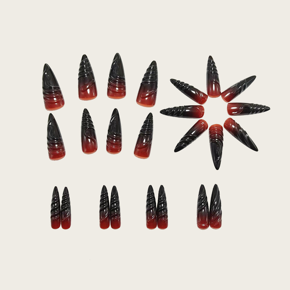 Gothic-style artificial nails with pointed tips and shiny surface Kalsten