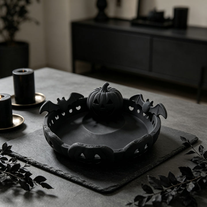 Halloween decorative bowl with carved pumpkin and bat appliqué