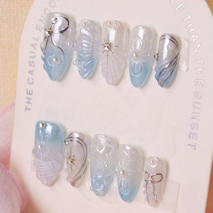 Artificial nail set with elegant shell and pearl accents Kalsten