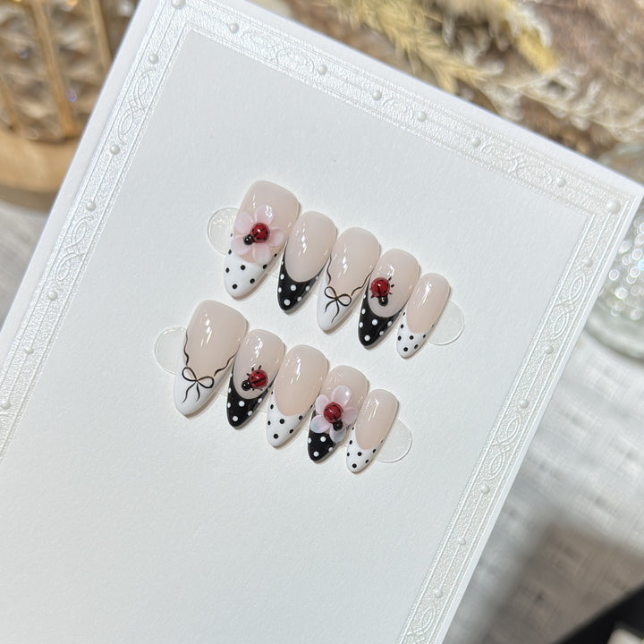 Artistic Stiletto Press-On Nail Set with Floral and Insect Designs Kalsten