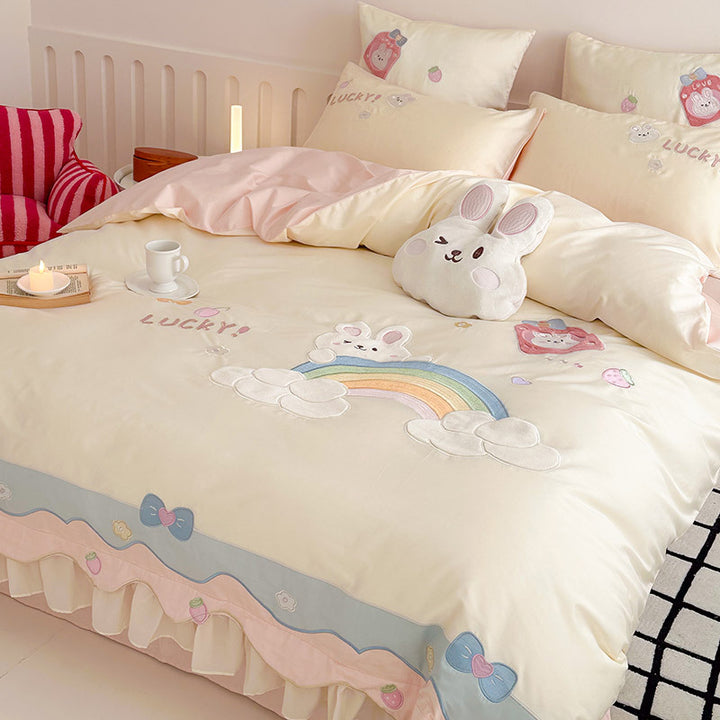 Playful cotton bedding set with appliqués and ruffles