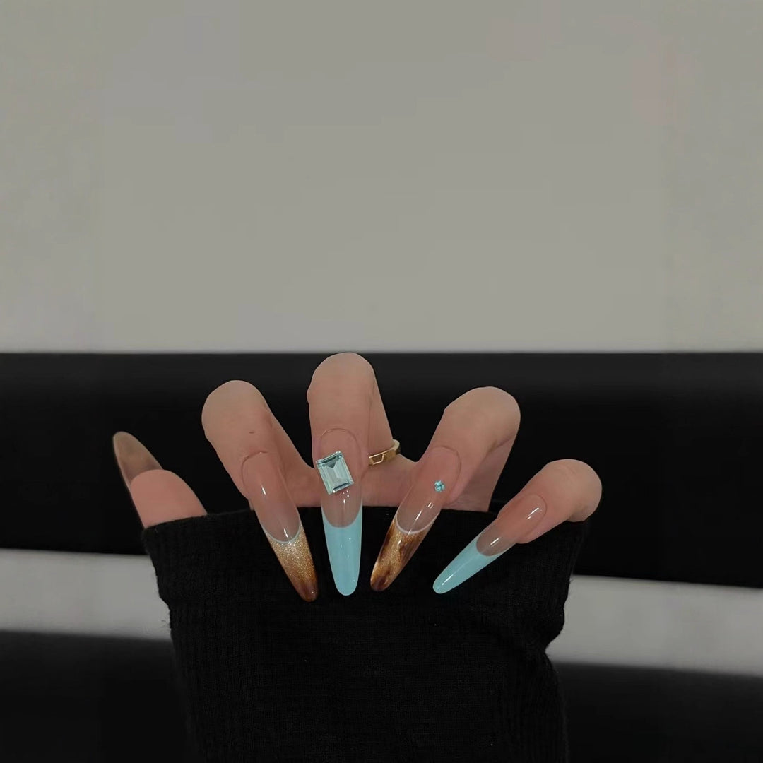 Elegant Stiletto Nail Extensions with Glitter Accents