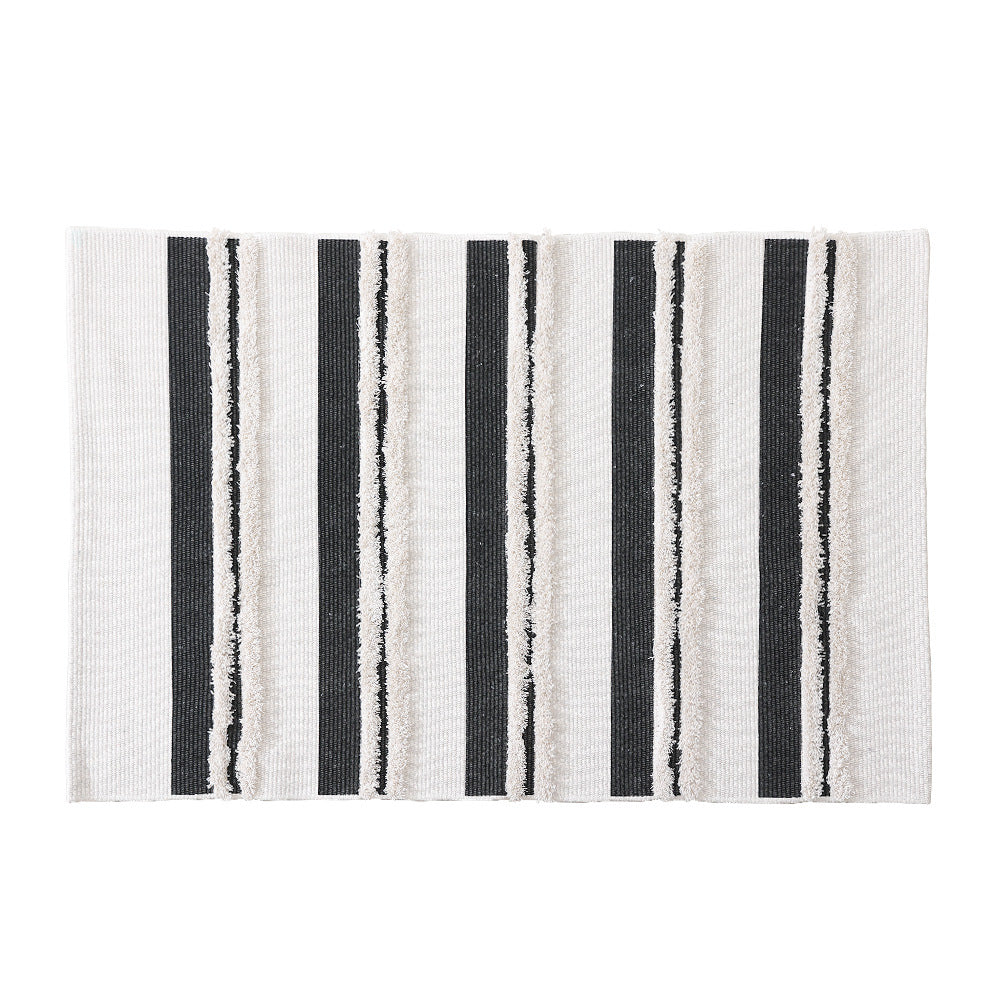 Rectangular flat-woven cotton rug with raised tufted stripes