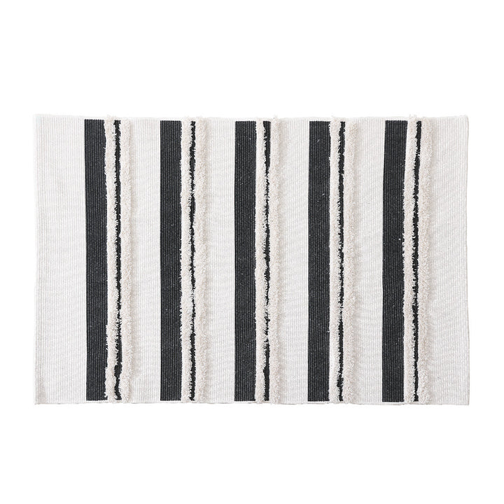 Rectangular flat-woven cotton rug with raised tufted stripes