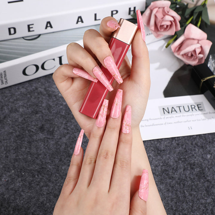 Artificial nails in elegant geometric design Kalsten