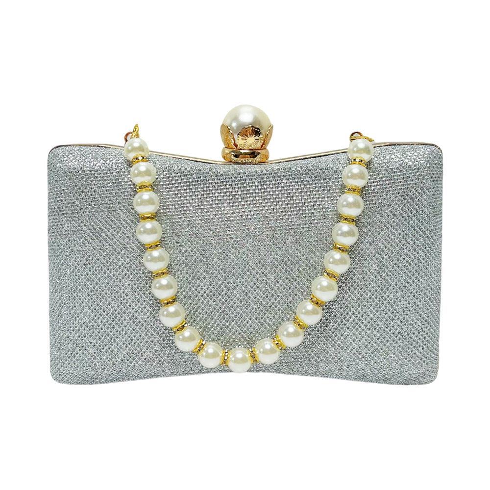 rhinestone-embellished evening clutch