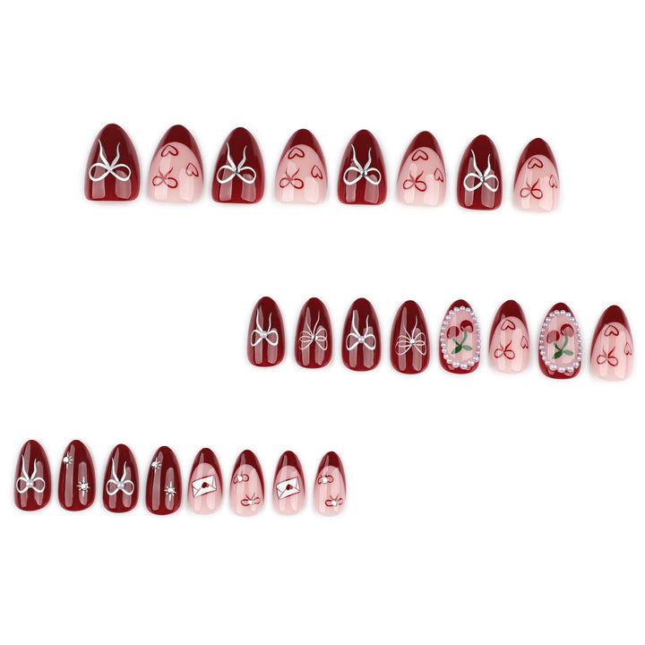 Artful nail designs with bow and rose motif Kalsten