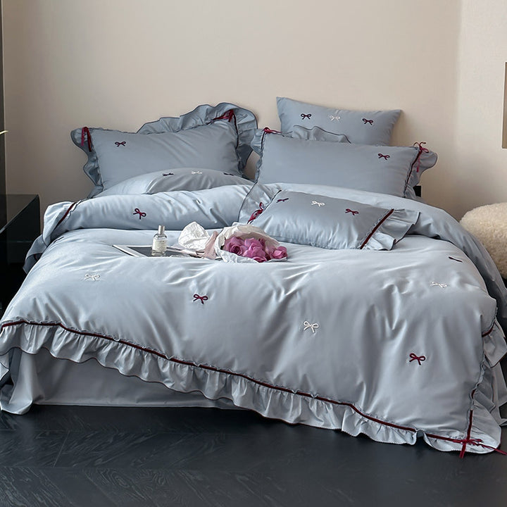 Premium bedding set made of cotton satin with ruffles and bow embroidery