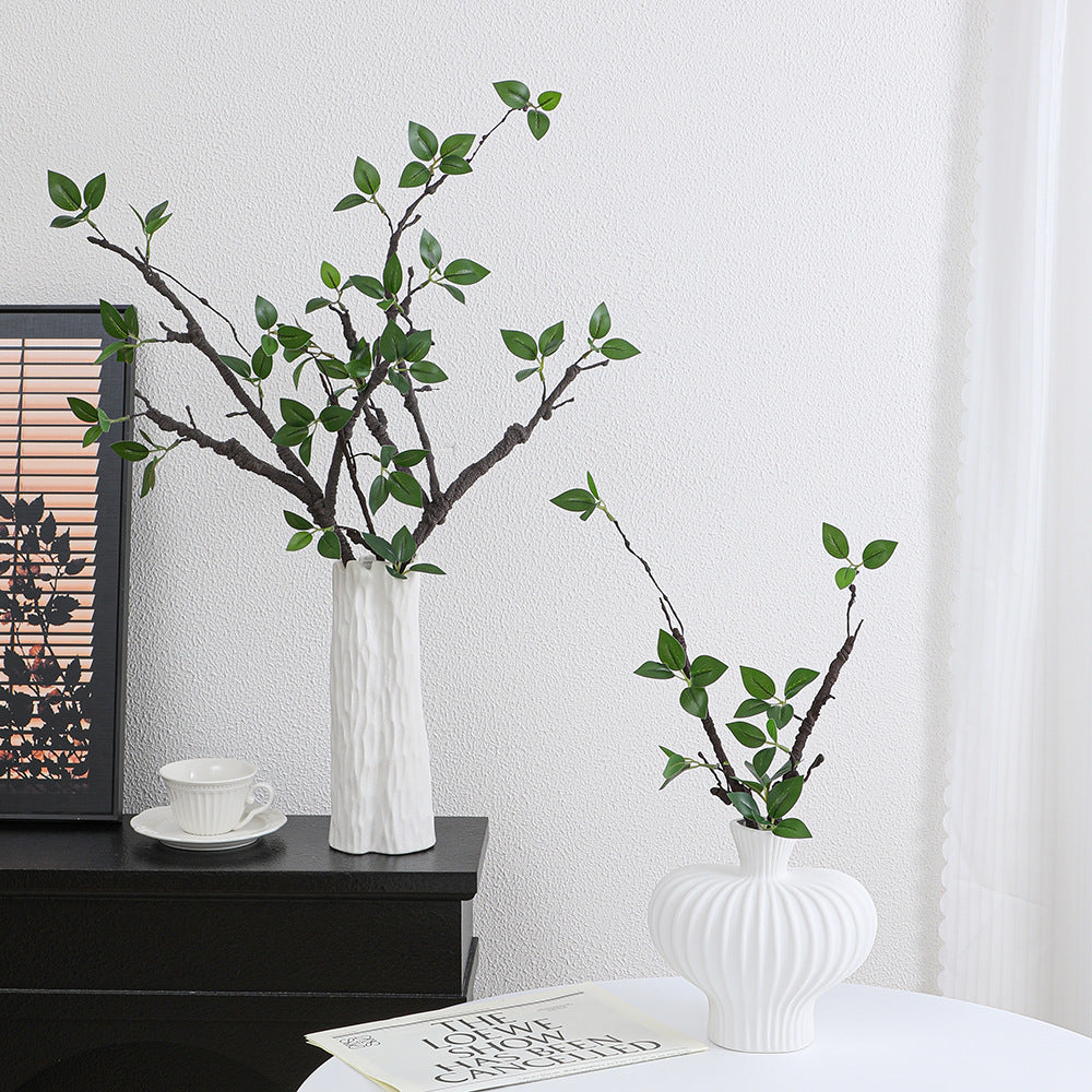 Decorative artificial tree branch with realistic leaves