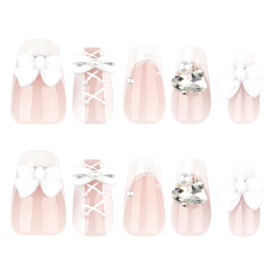 Artful Nail Art with Bows and Rhinestone Decorations Kalsten