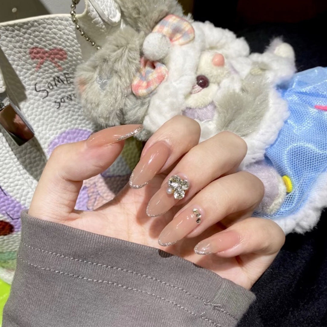 Artful Nail Art with Rhinestone Embellishments Kalsten