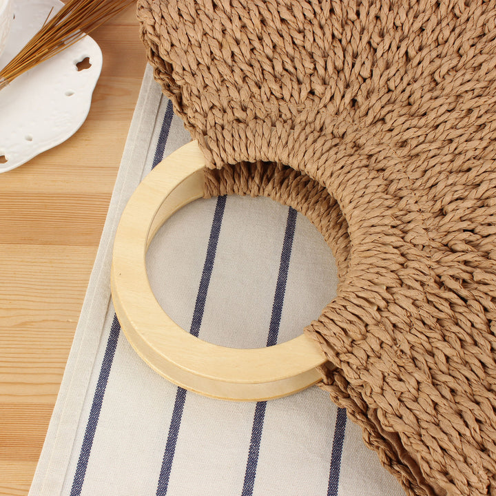 Designer bag made of hand-woven wicker with wooden handle Kalsten