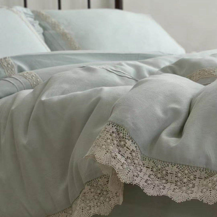 Bedding set in linen look with delicate crochet lace
