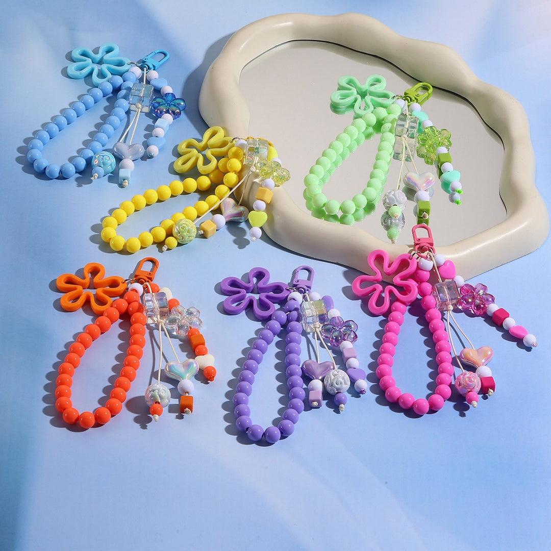 Playful keychain with flower and butterfly details Kalsten
