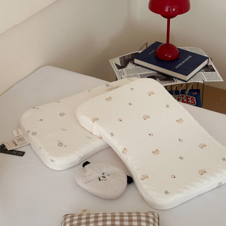 Ergonomic baby pillow with anti-flat head contour and washable cotton cover