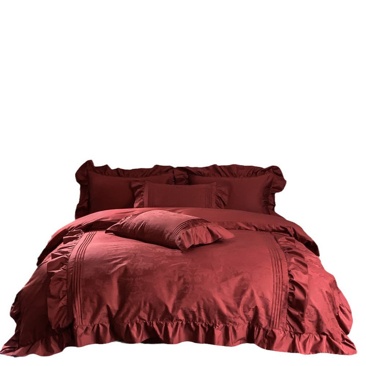 Elegant satin bedding set with ruffles, fine piping and jacquard relief