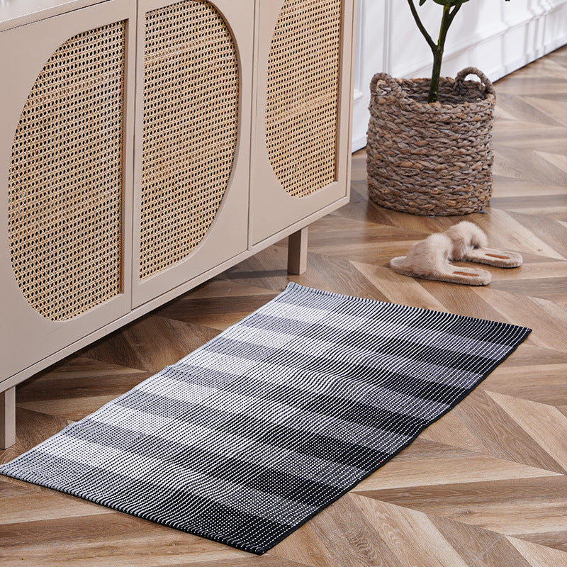 woven living room runner with fringes and geometric weave pattern